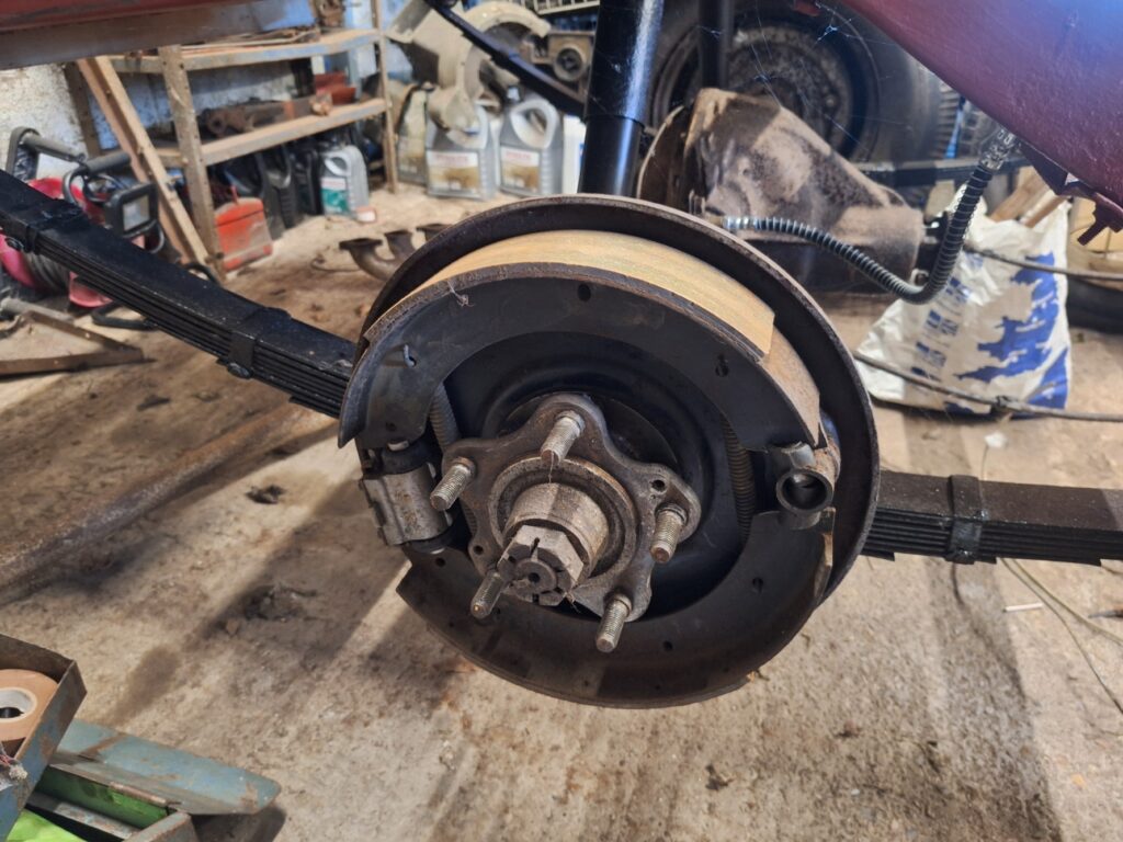 Drums off , brake shoes will go again