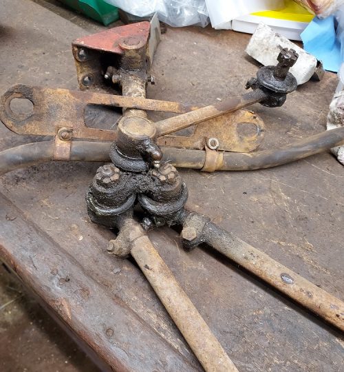 Steering tie rods awaiting stripping and cleaning